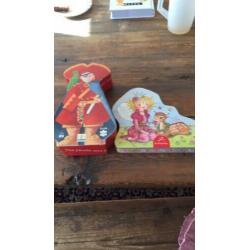 2 x puzzels, piraat en elfje, die spiegelburg en djeco.