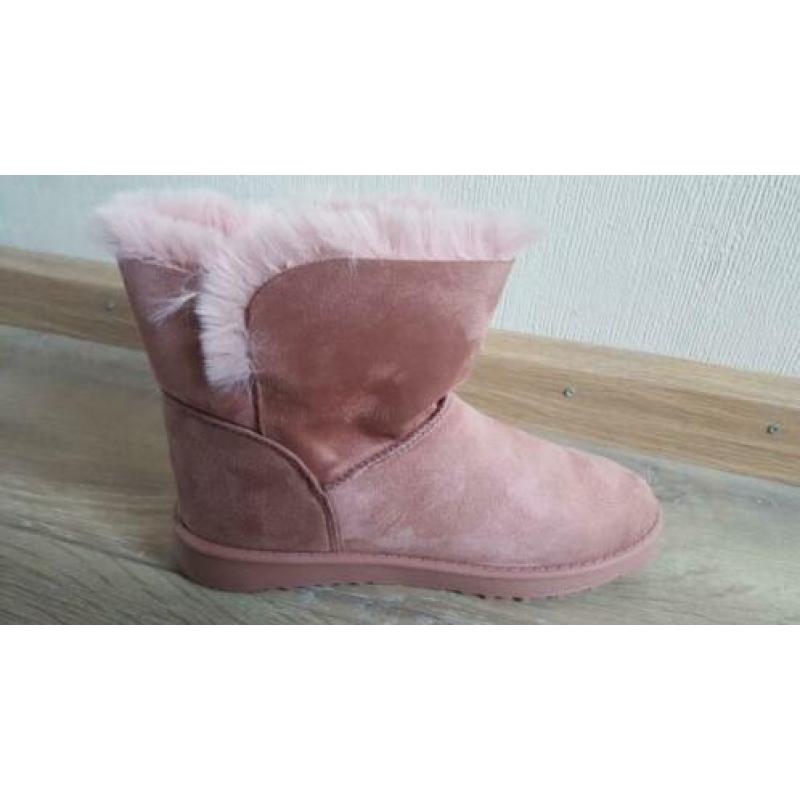 Partij roze laarsjes 7 paar.