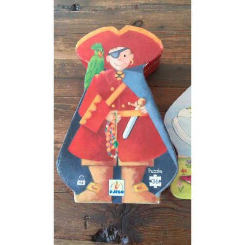 2 x puzzels, piraat en elfje, die spiegelburg en djeco.