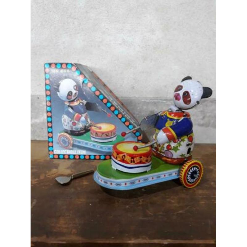 oude vintage blikken speelgoed drumming animal panda frictie