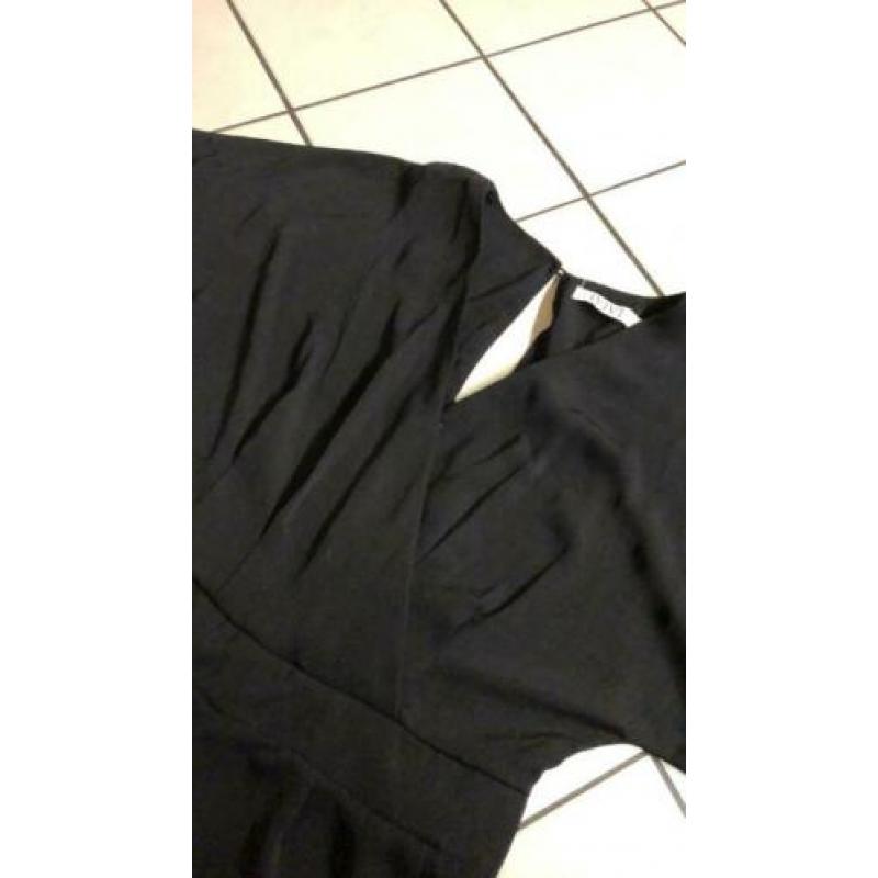 Jumpsuit nieuw met open rug