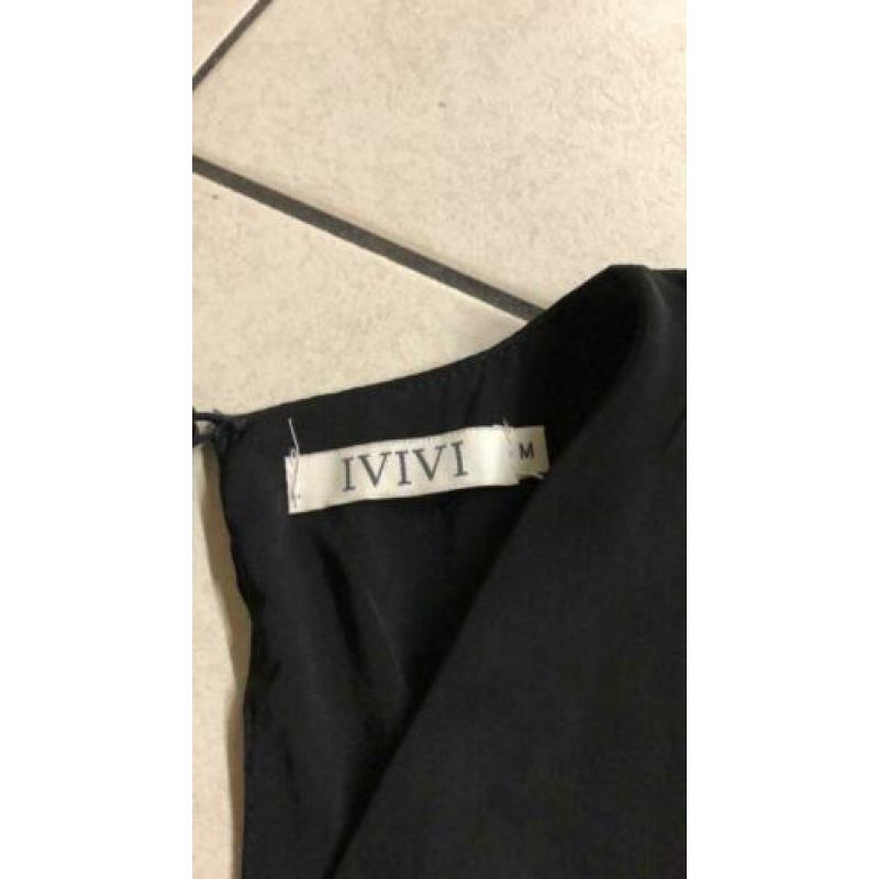 Jumpsuit nieuw met open rug