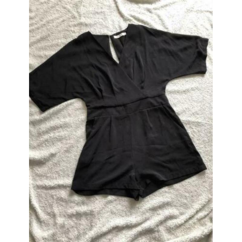 Jumpsuit nieuw met open rug
