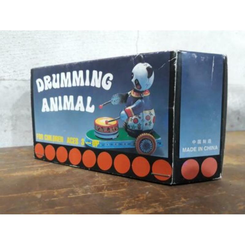 oude vintage blikken speelgoed drumming animal panda frictie