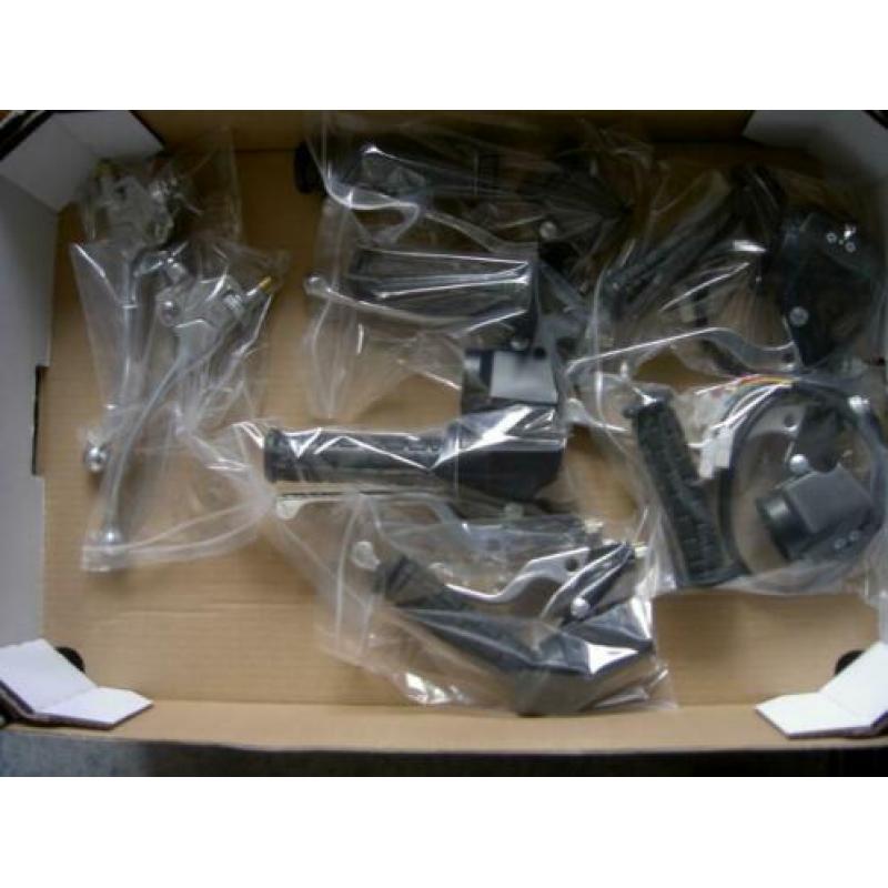 a.s zondag beurs Schiedam div. bromfiets onderdelen te koop