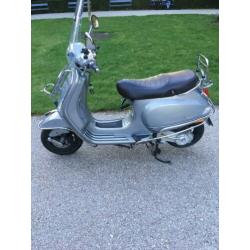 Vespa LX Touring snor 2014