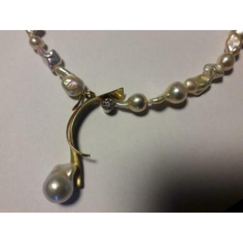 Exclusief collier twinparels, 14 karaat geelgoud en diamant