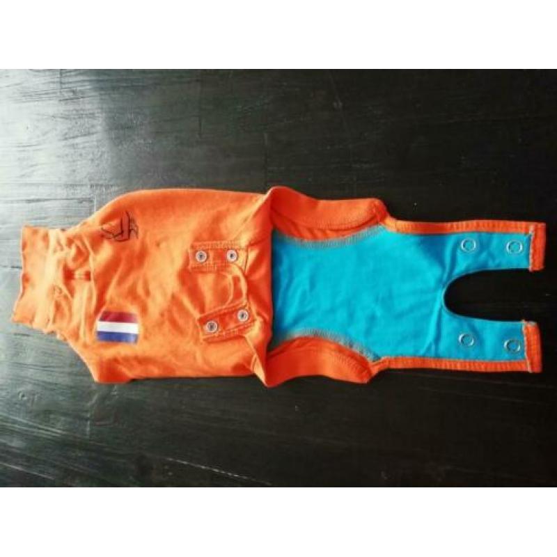 Hondenpakje oranje maat xs.