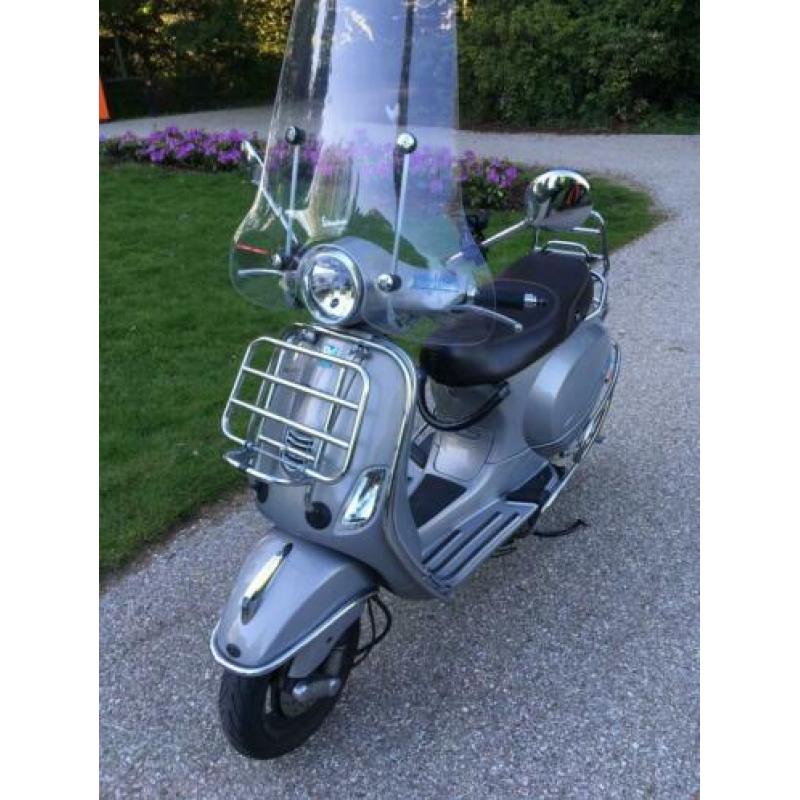 Vespa LX Touring snor 2014