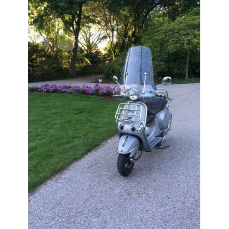 Vespa LX Touring snor 2014