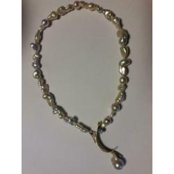 Exclusief collier twinparels, 14 karaat geelgoud en diamant