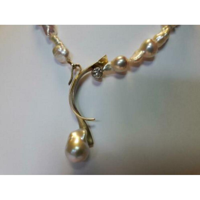 Exclusief collier twinparels, 14 karaat geelgoud en diamant