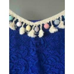Superr trendy kanten tuniek met trompetmouw mt 48/50