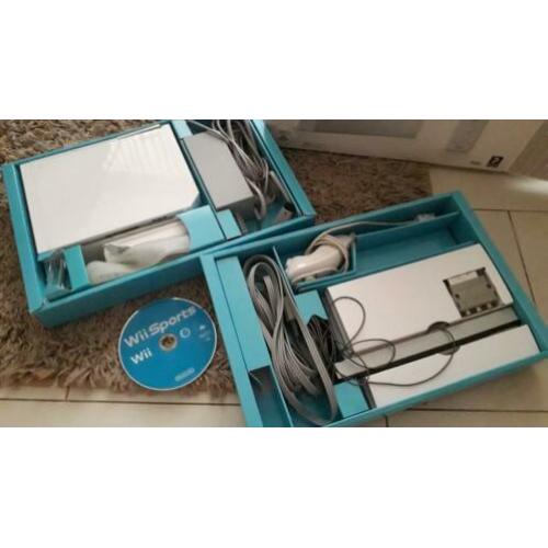 Nintendo Wii + balance board, 2 stuurtjes 50 €