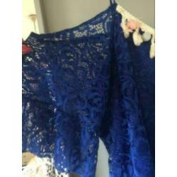 Superr trendy kanten tuniek met trompetmouw mt 48/50
