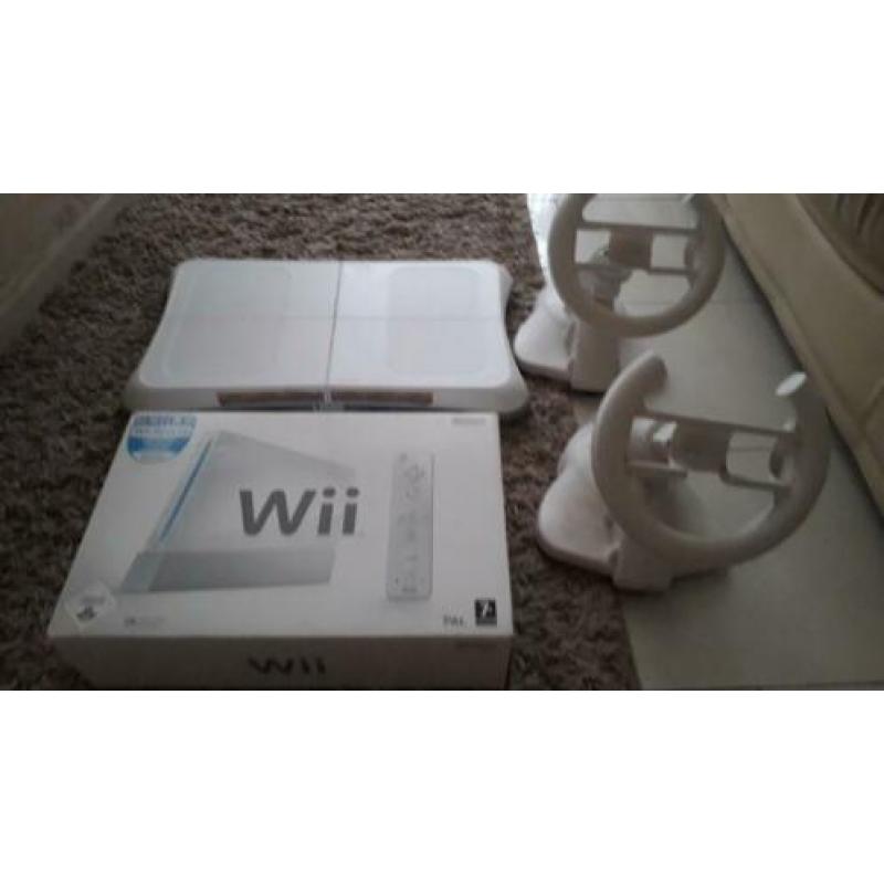 Nintendo Wii + balance board, 2 stuurtjes 50 €