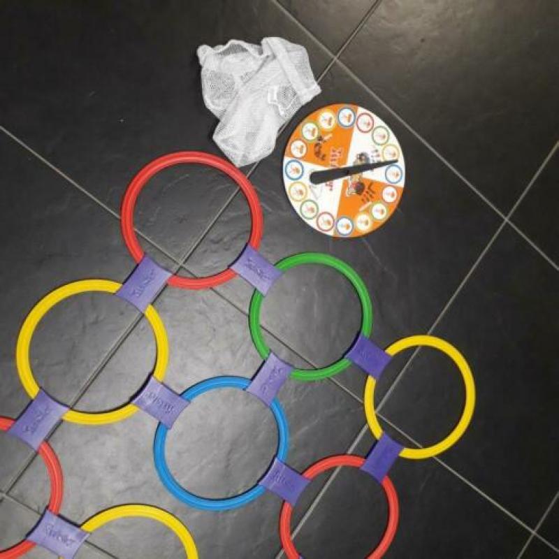Twister spel van MB met losse ringen, nieuw in zak
