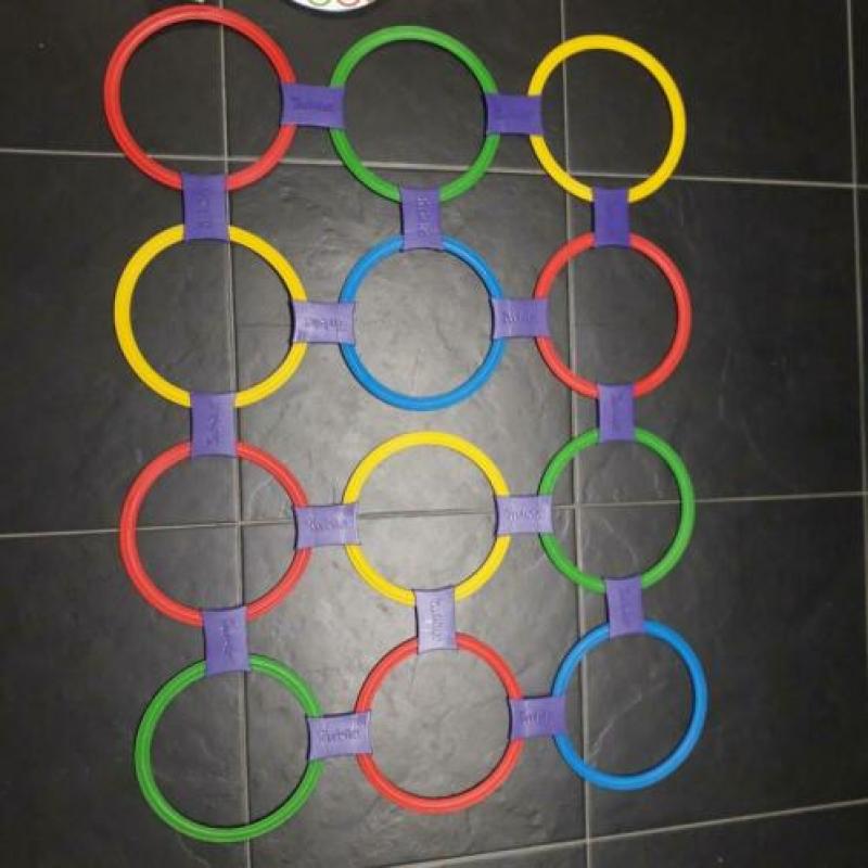 Twister spel van MB met losse ringen, nieuw in zak