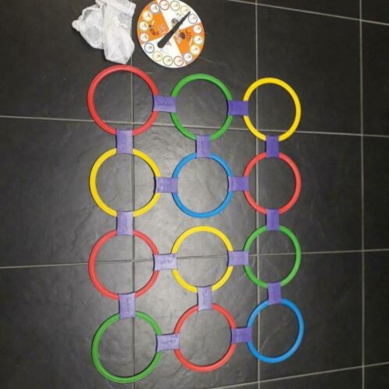 Twister spel van MB met losse ringen, nieuw in zak