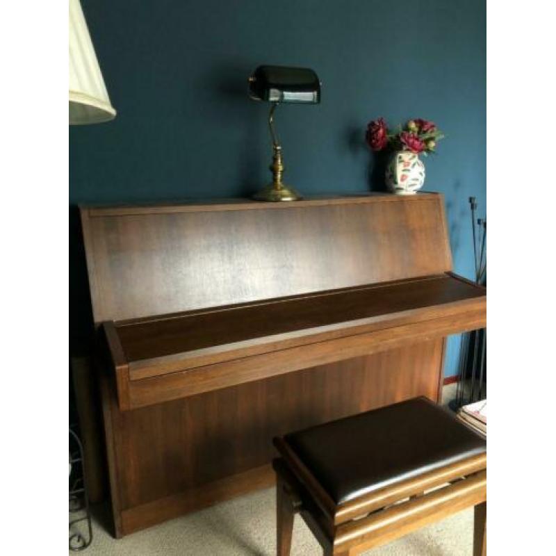 Piano! Met kruk Bied maar