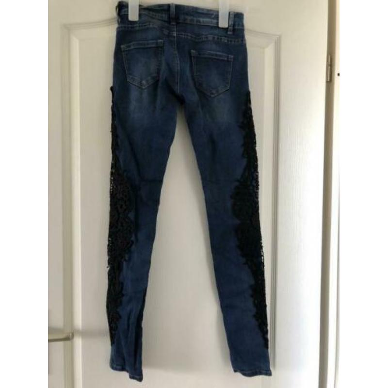Spijkerbroek maat 34/XS