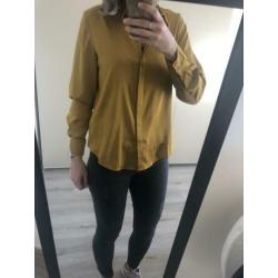 Goud kleurige blouse van de H&M maat S