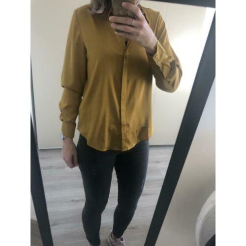 Goud kleurige blouse van de H&M maat S