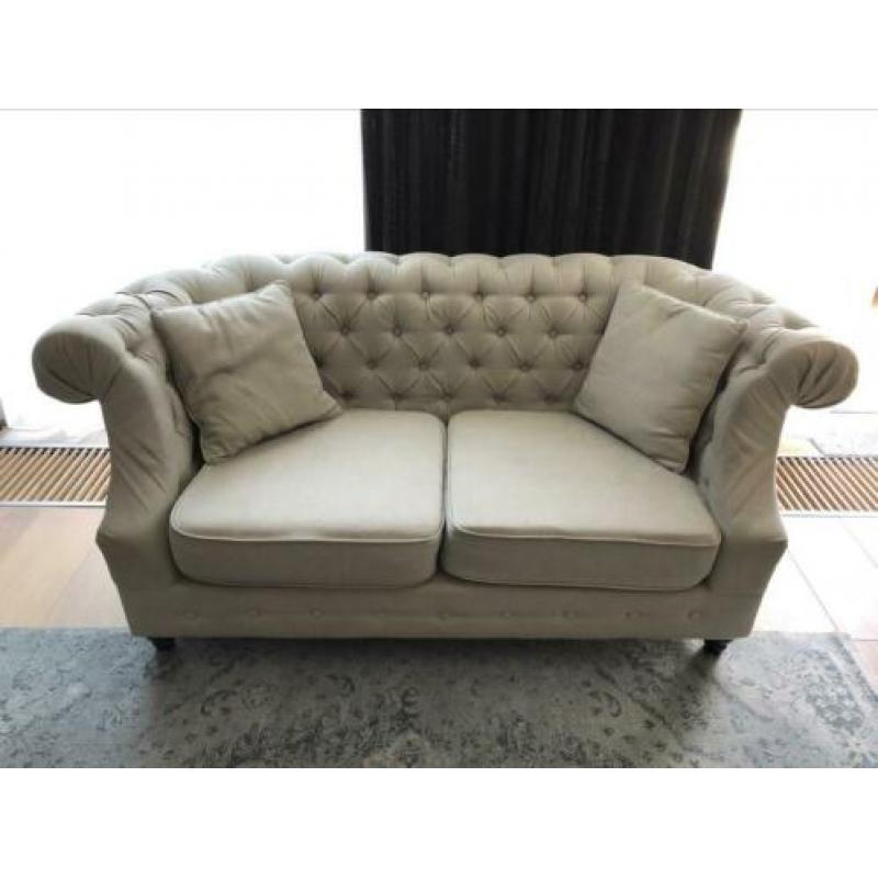 Cremekleurige stoffen banken (2- en 3-zits)