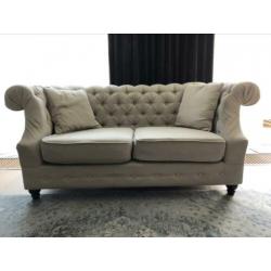 Cremekleurige stoffen banken (2- en 3-zits)