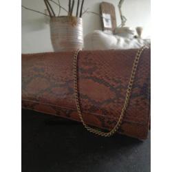 Vintage slangenprint oude damestasjes