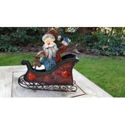 Blikken arreslee met kerstman.