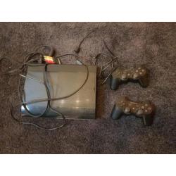 playstation 3 met 2 controllers en 5 leuke spellen