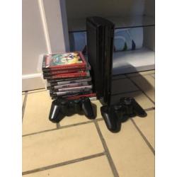 Ps3 super slim 500gb met vele extras en games